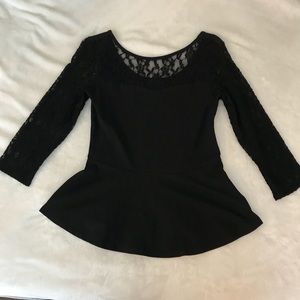 Black peplum hem top